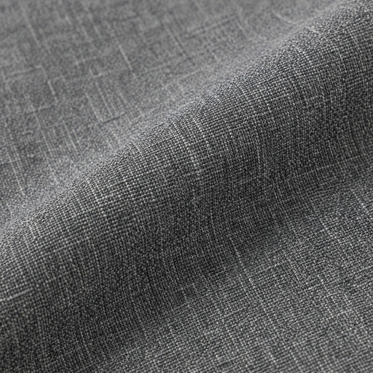 Close-up of gray fabric with a subtle pattern