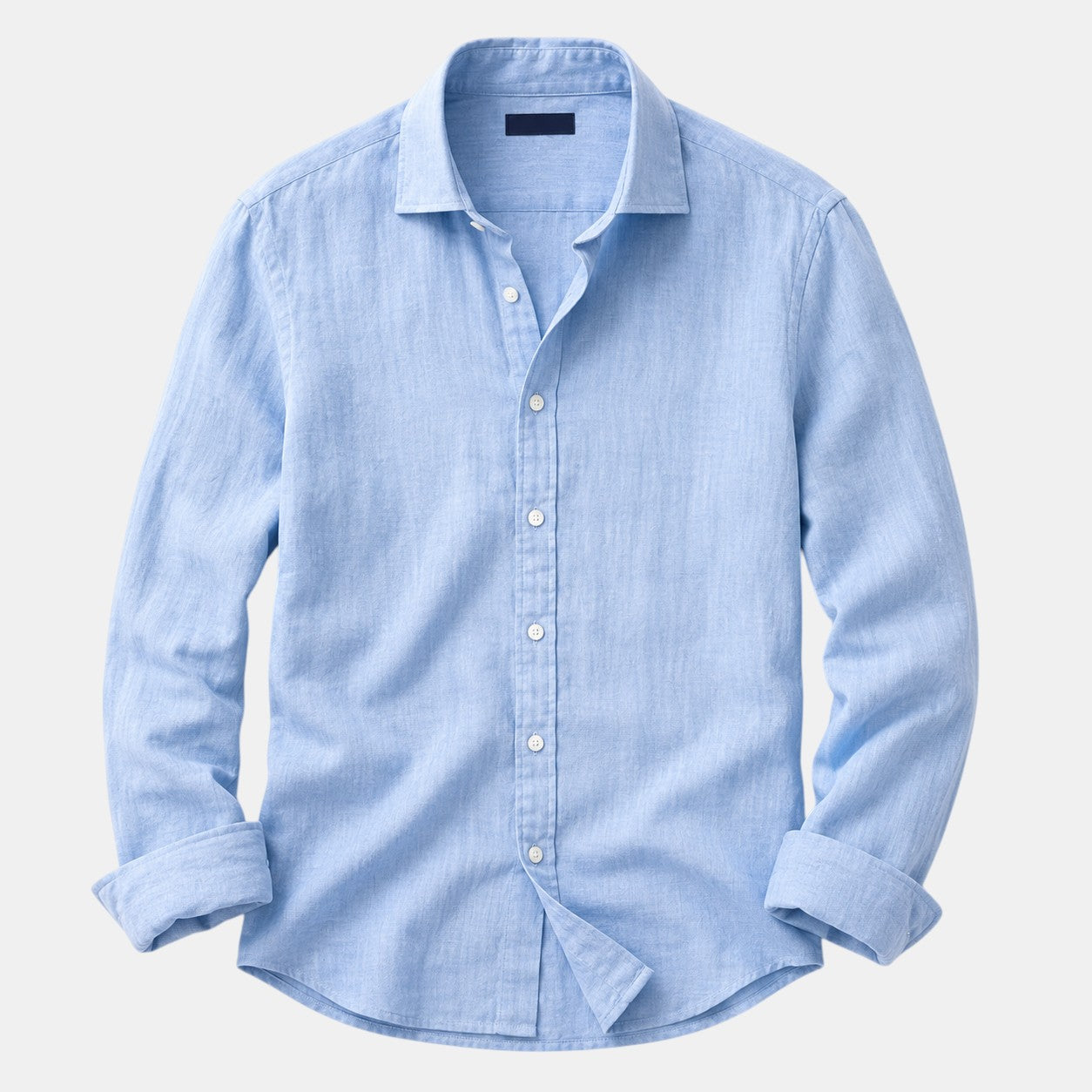 Light blue button-up shirt on a light gray background