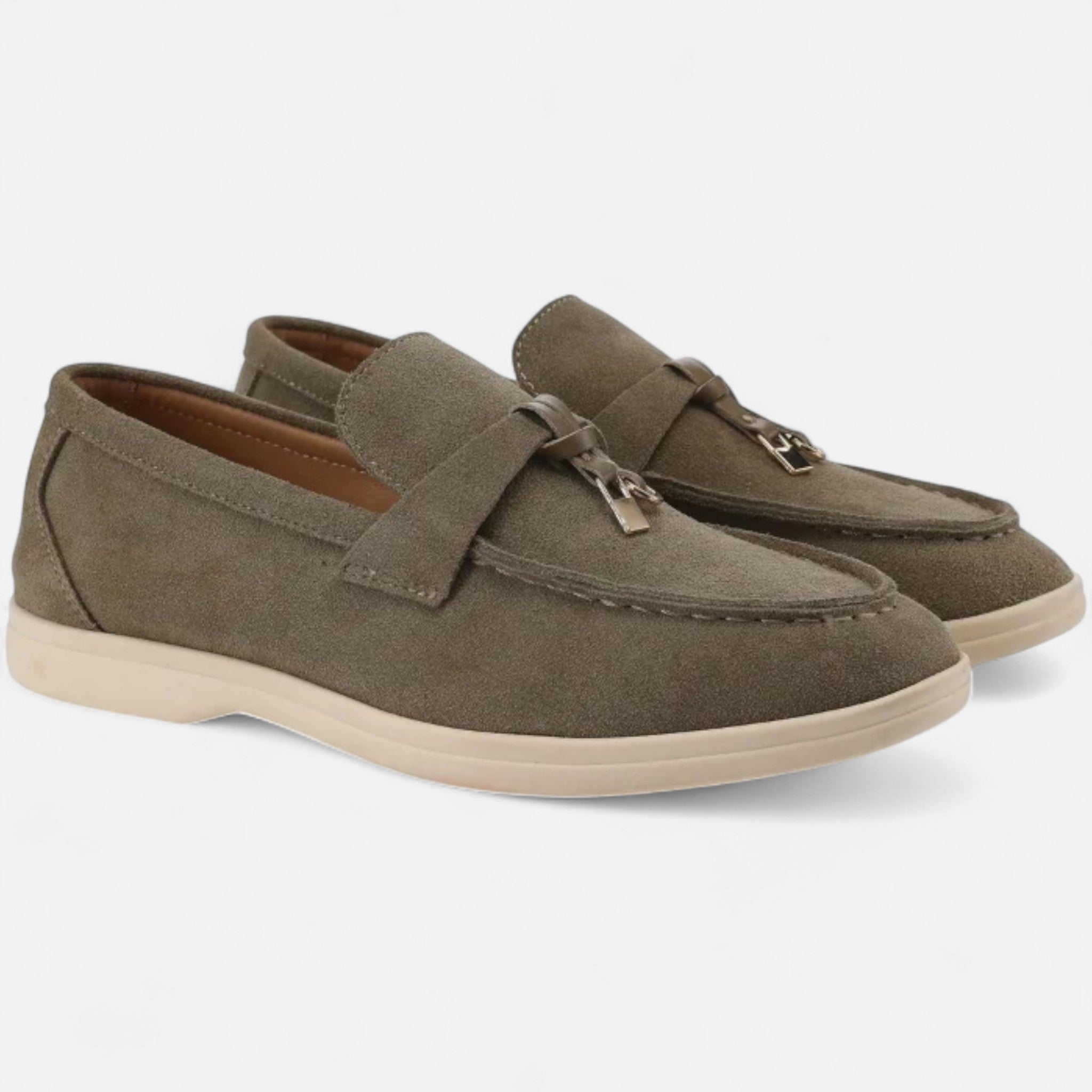 Pair of brown loafers on a white background