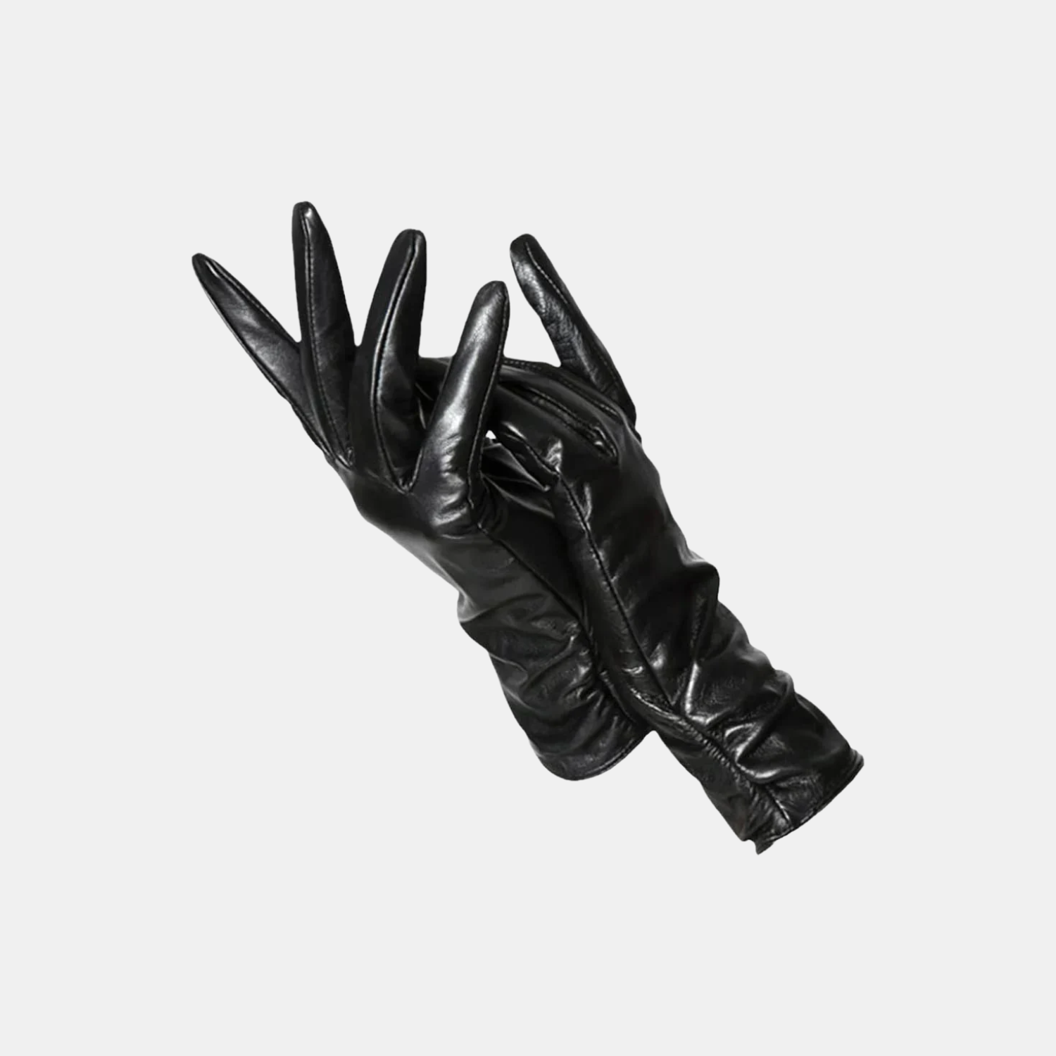 A pair of black leather gloves with long cuffs, displayed against a solid light gray background.
