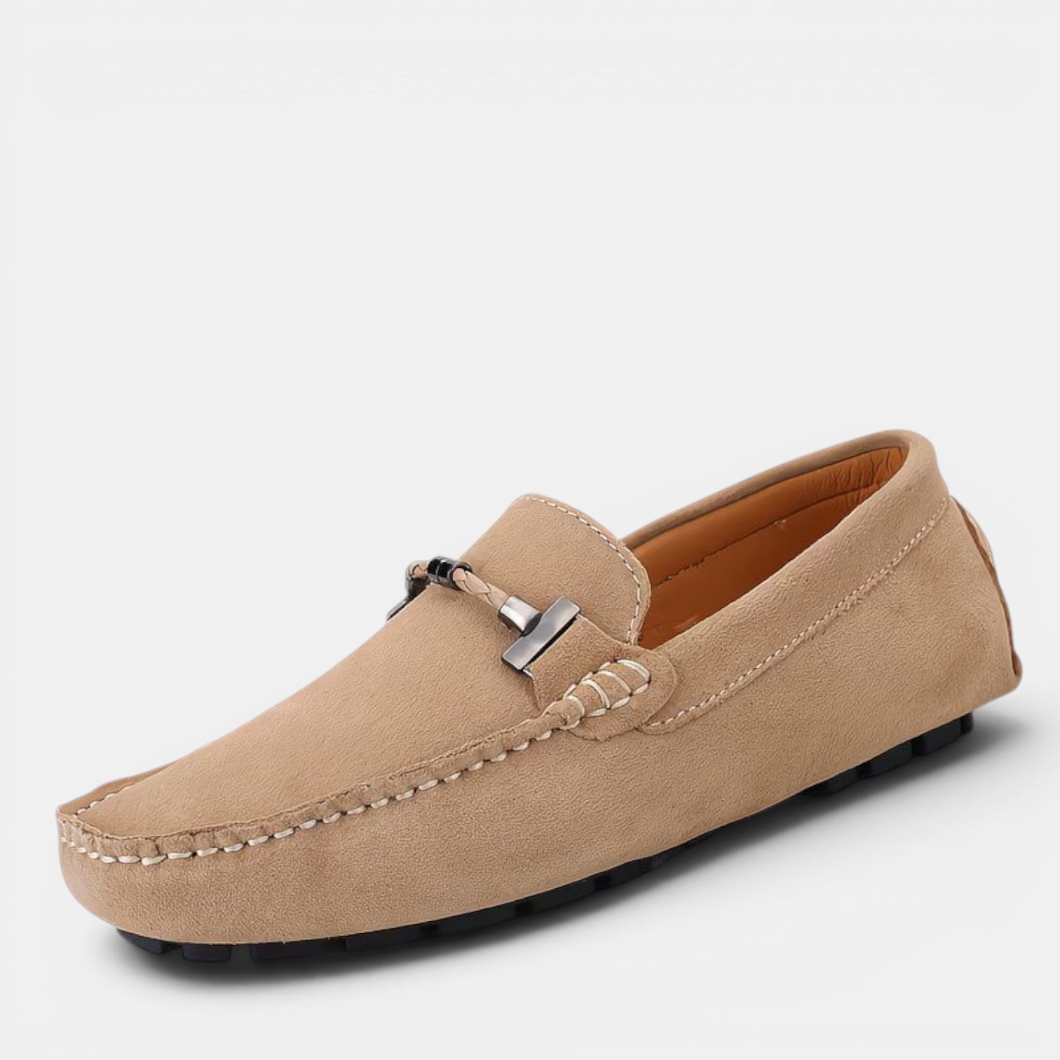 Beige loafer shoe on a light gray background