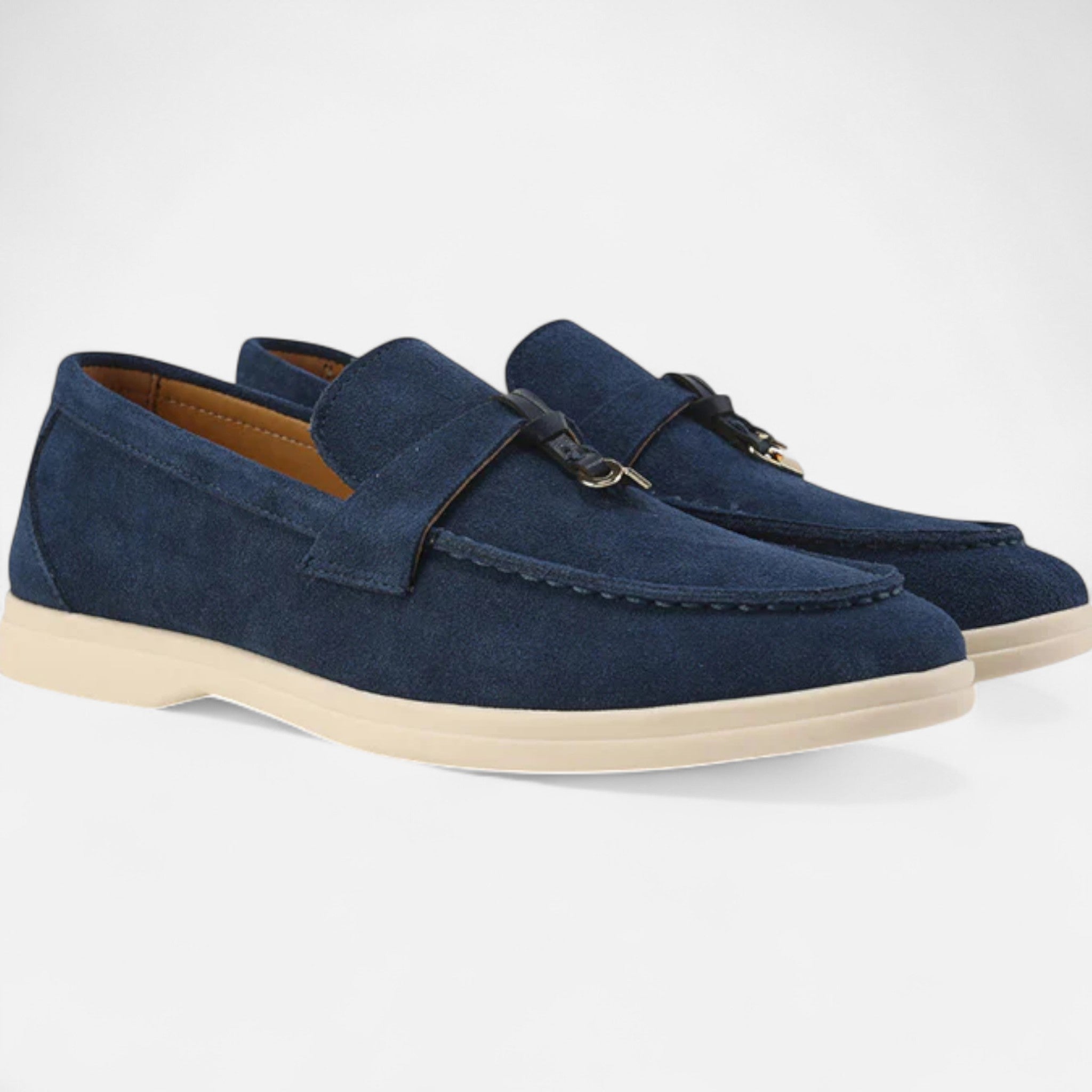 Pair of blue loafers on a white background