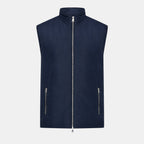 Navy blue vest with zippers on a light gray background