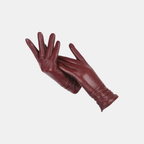 A pair of long burgundy leather gloves with a smooth finish, displayed against a solid light gray background.