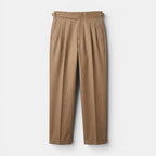 Tan pleated pants on a white background