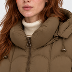 Close-up of women's taupe brown puffer jacket with adjustable hood and front zipper