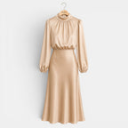 Beige satin dress on a hanger against a light gray background