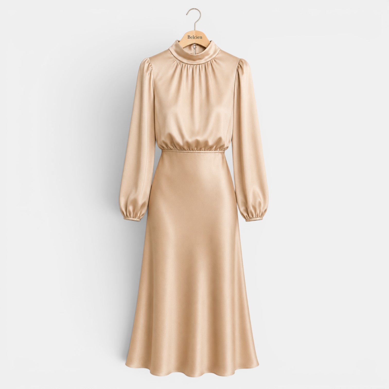 Beige satin dress on a hanger against a light gray background