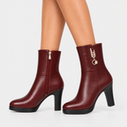 Side view of women's burgundy ankle boots with side zipper and block heels