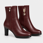 Women's burgundy leather ankle boots with side zipper, rounded pointed toes, and block heels