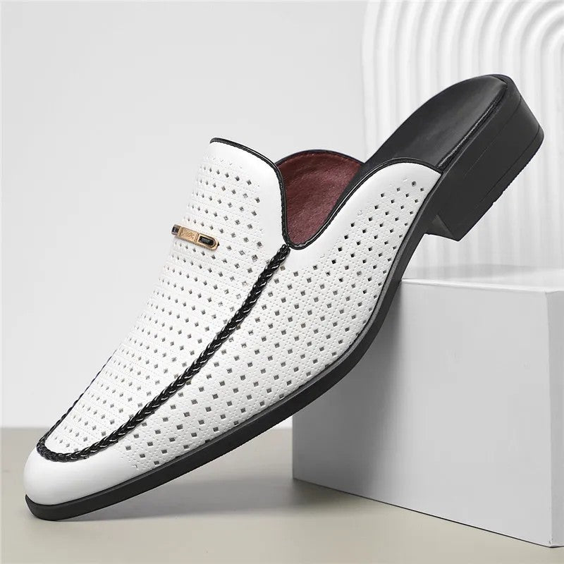White loafer with black accents on a white background