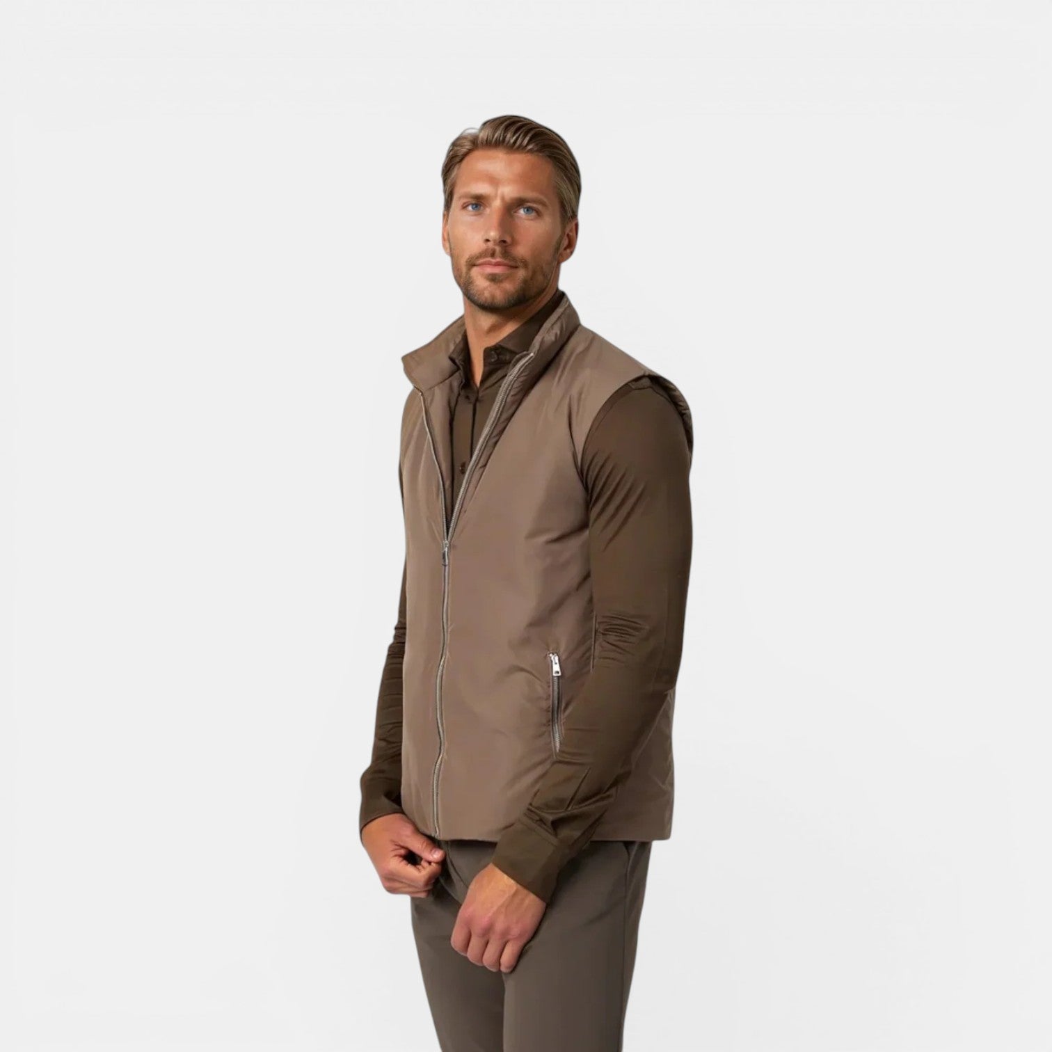 Man wearing a brown jacket on a white background