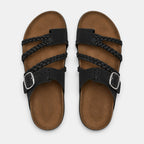 Top view of black braided strap sandals with adjustable buckles and brown footbeds.