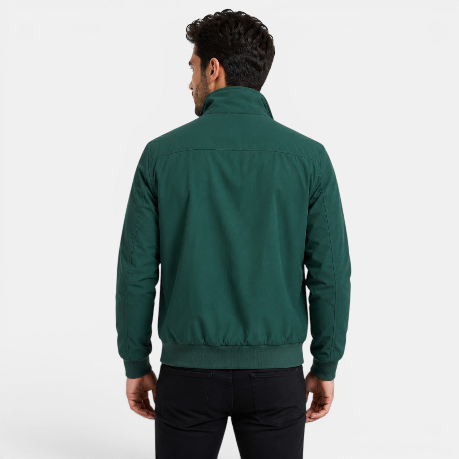 Man wearing a green jacket on a white background