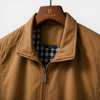 Brown jacket on a hanger with 'Belfcien' branding