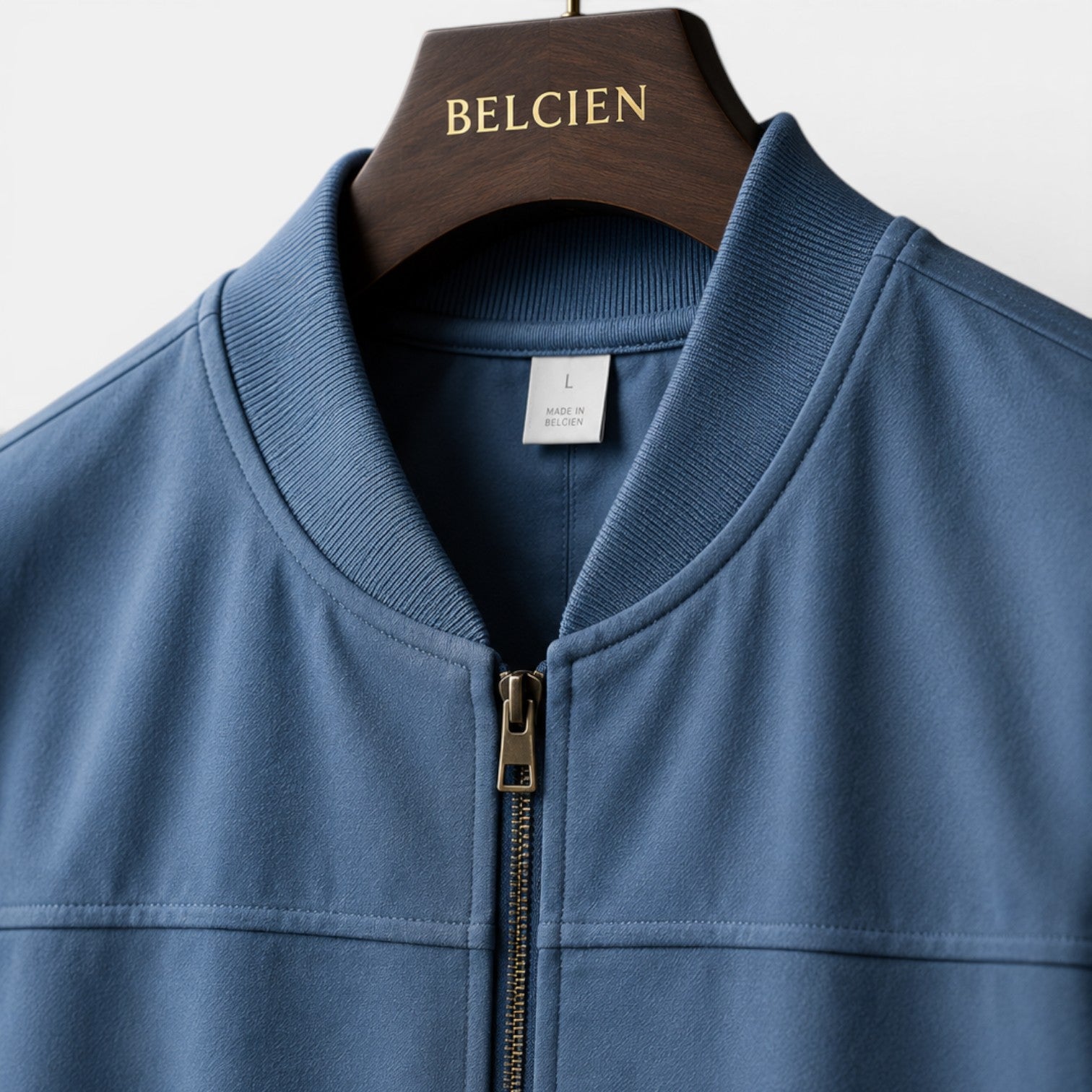 Blue jacket on a hanger with 'BELCIEN' branding
