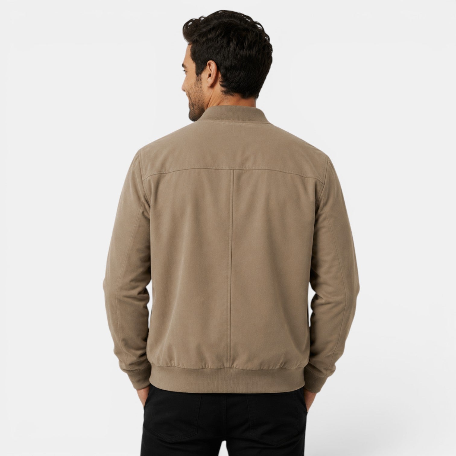 Man wearing a beige jacket on a white background