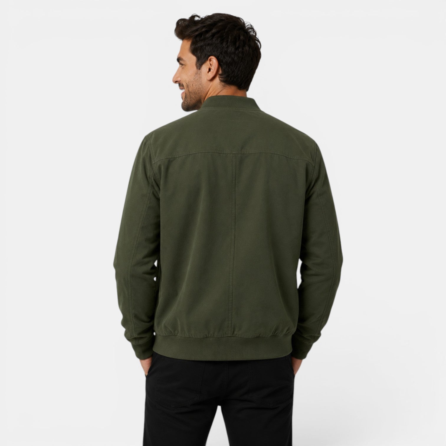 Man wearing a green jacket on a white background