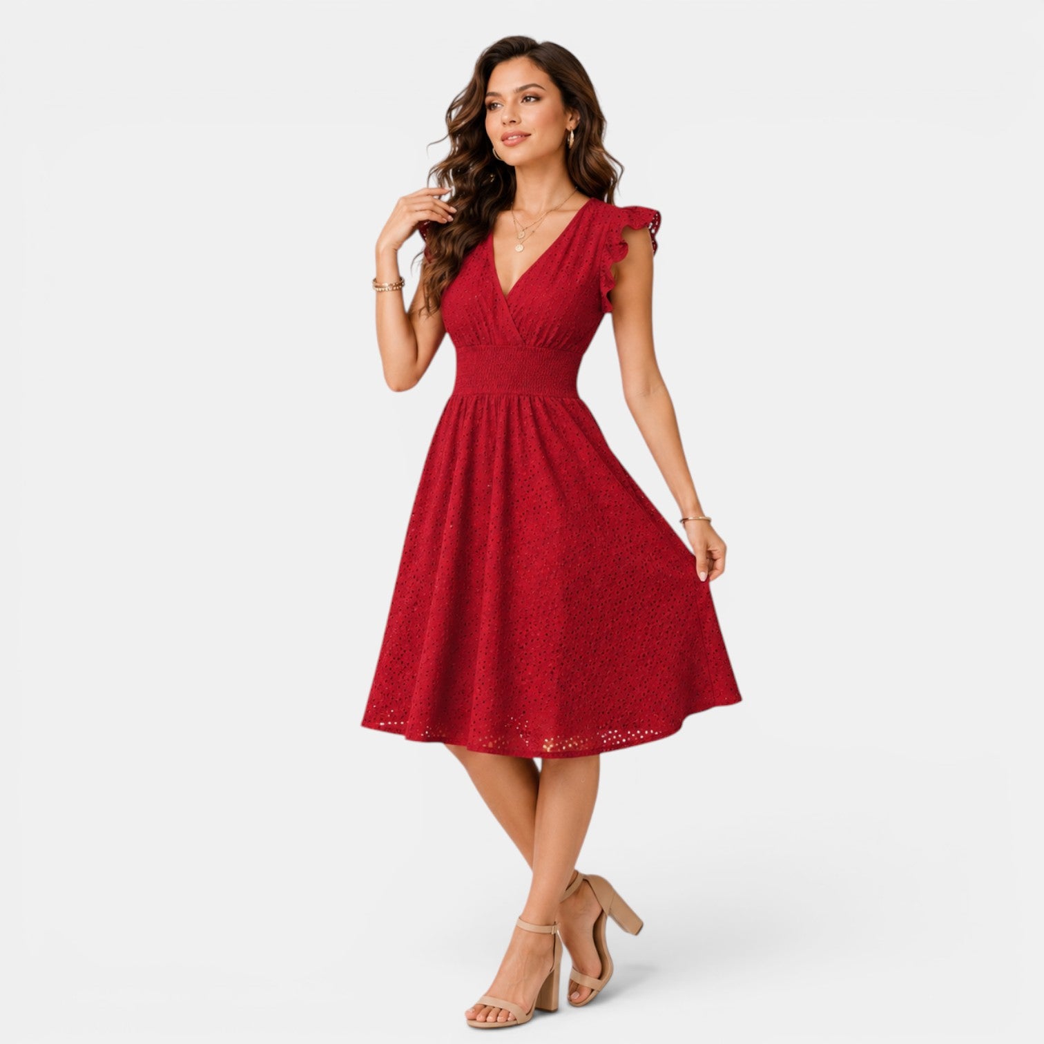 Woman wearing a red dress on a white background