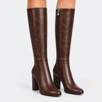 Front view of dark brown knee-high boots with slim shafts and block heels