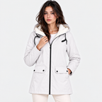 A woman modeling a light gray hooded jacket with a white sherpa-lined hood, black drawstrings, and black zipper details, set against a plain white studio background.
