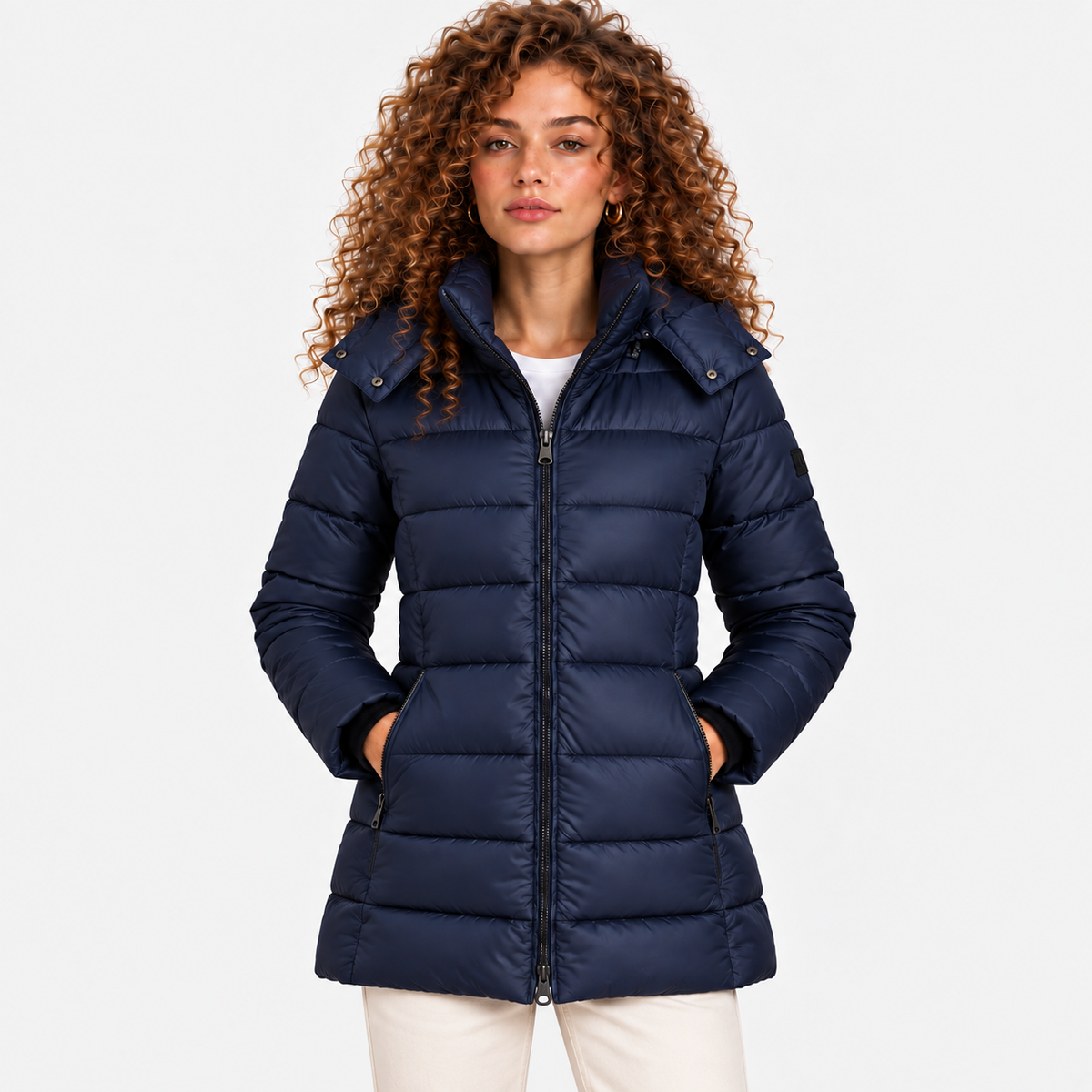 Women's navy blue quilted puffer coat with stand collar, front zipper, and side pockets
