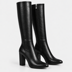 Women's black knee-high boots with side zipper, pointed toes, and block heels