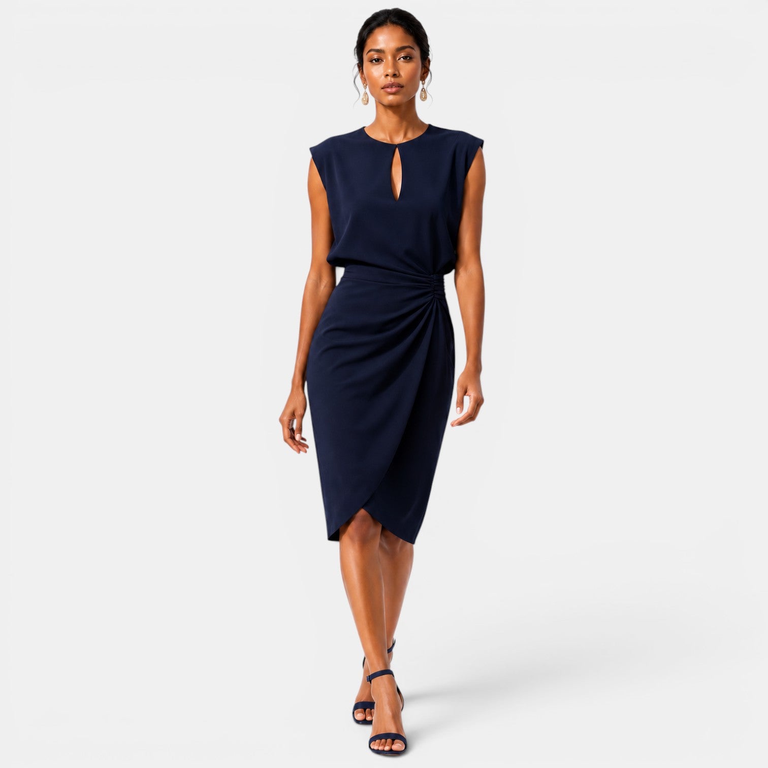 Woman wearing a navy blue dress on a white background
