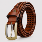 A brown braided leather belt with a polished gold-tone metal buckle, neatly coiled on a light gray background.