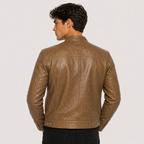 A man wearing a brown leather jacket, shown from the back against a light gray studio background.