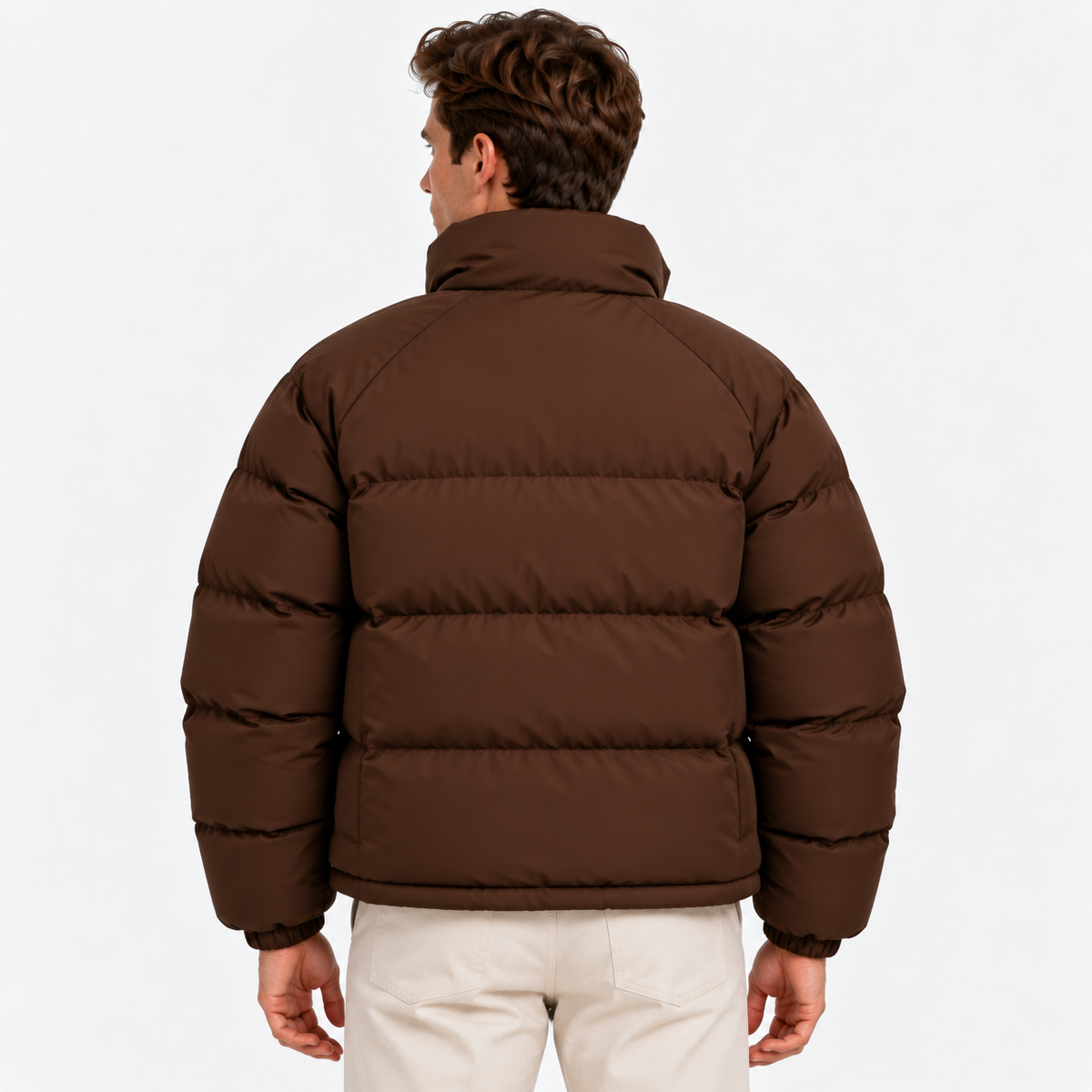 Back view of a men's brown quilted puffer jacket