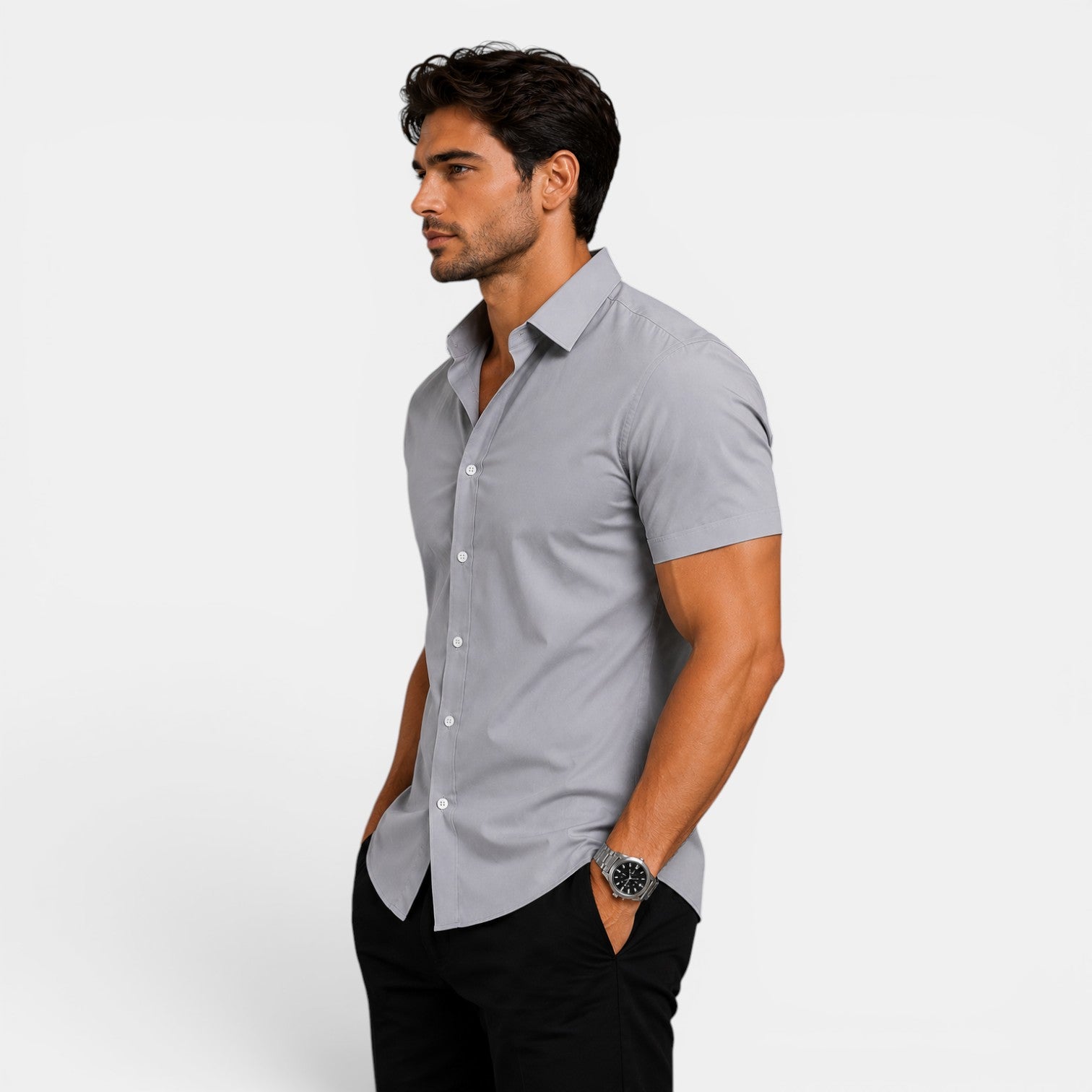 Man wearing a gray short-sleeve shirt on a white background