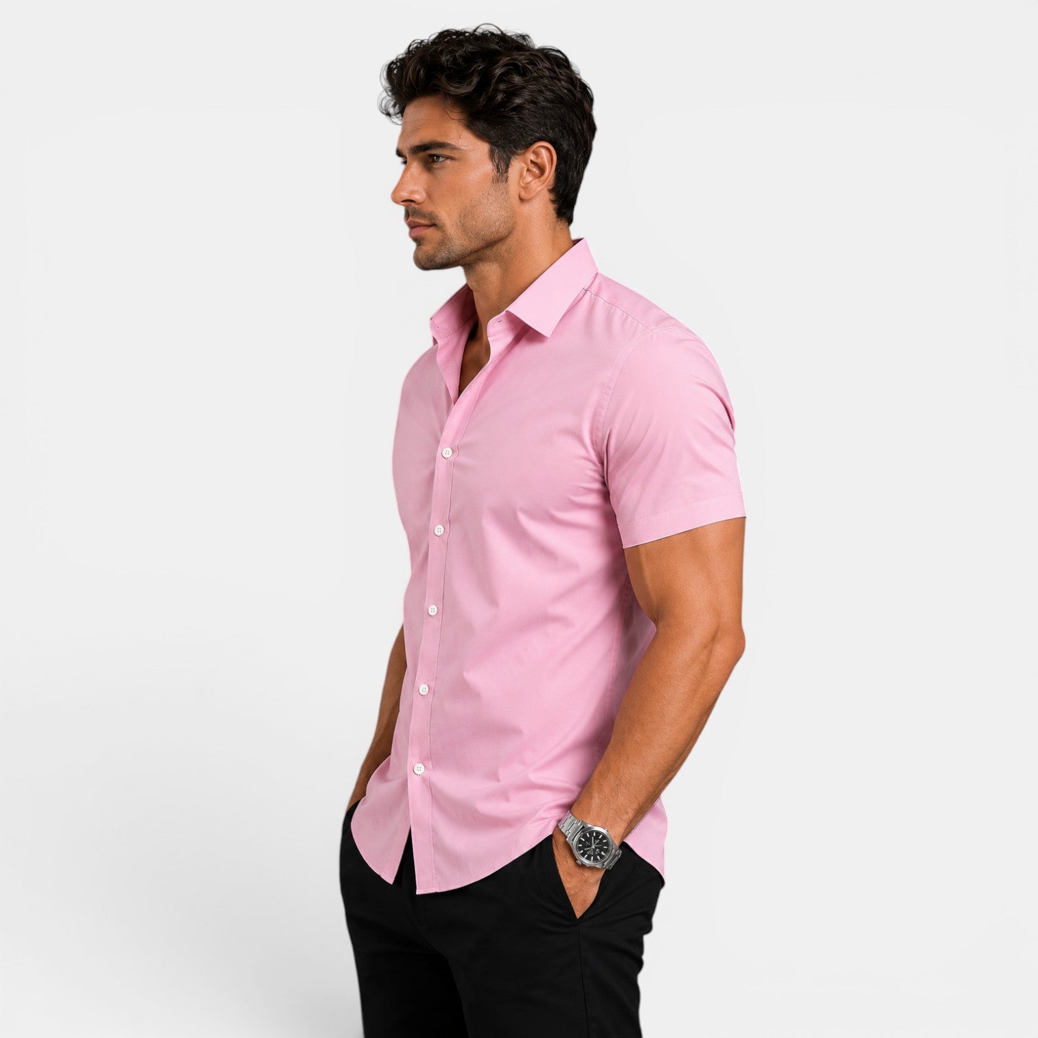 Man wearing a pink short-sleeve shirt on a white background