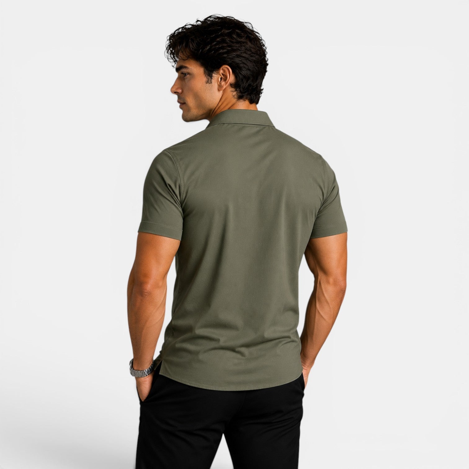 Man wearing a green polo shirt on a white background