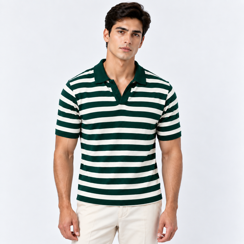 A man modeling a short-sleeve polo shirt with dark green and white horizontal stripes, paired with off-white trousers, against a light gray studio background.