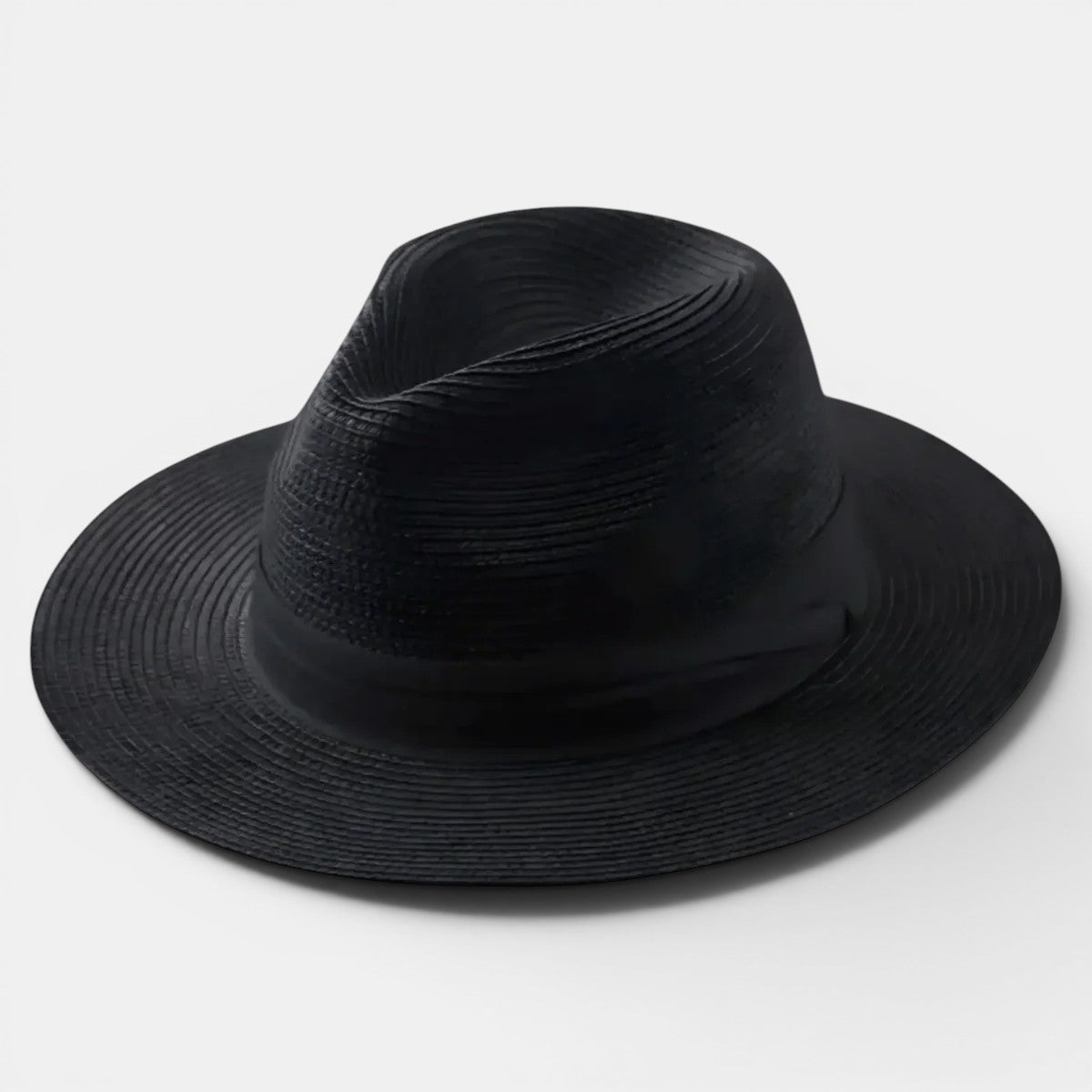 Black straw hat on a white background