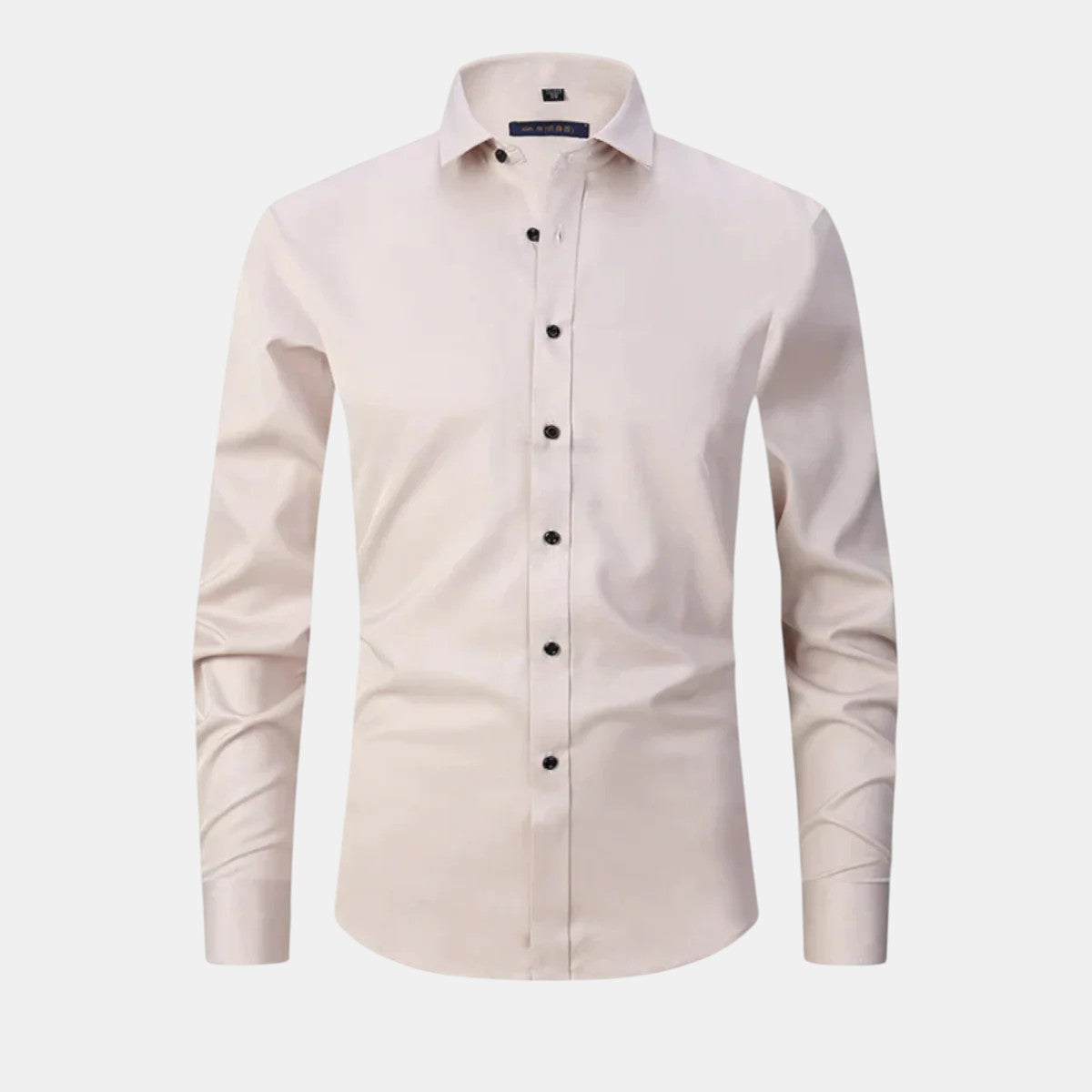 Beige dress shirt with black buttons on a white background