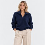 1. Women's navy blue knit pullover sweater with half-zip collar and long sleeves