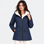 A woman wearing a navy blue hooded parka jacket with a cream sherpa-lined hood, black zipper, and front flap pockets, photographed against a clean white studio background.