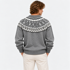 Back view of a man wearing a gray Fair Isle knit sweater with patterned yoke
