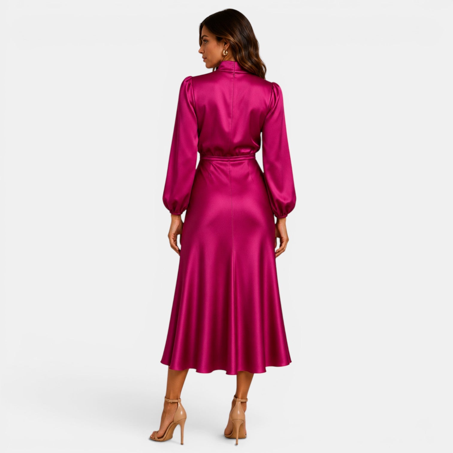 Woman wearing a pink satin dress on a white background