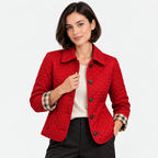 Women's red quilted jacket with pointed collar, black buttons, and front pockets