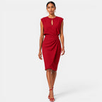 Woman wearing a red dress on a white background