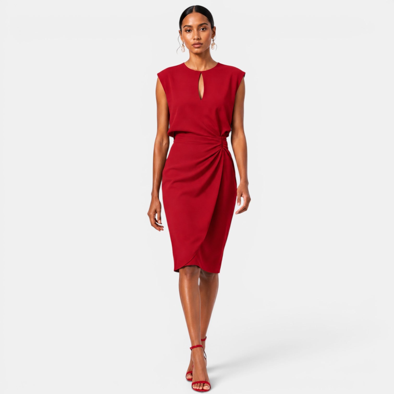 Woman wearing a red dress on a white background