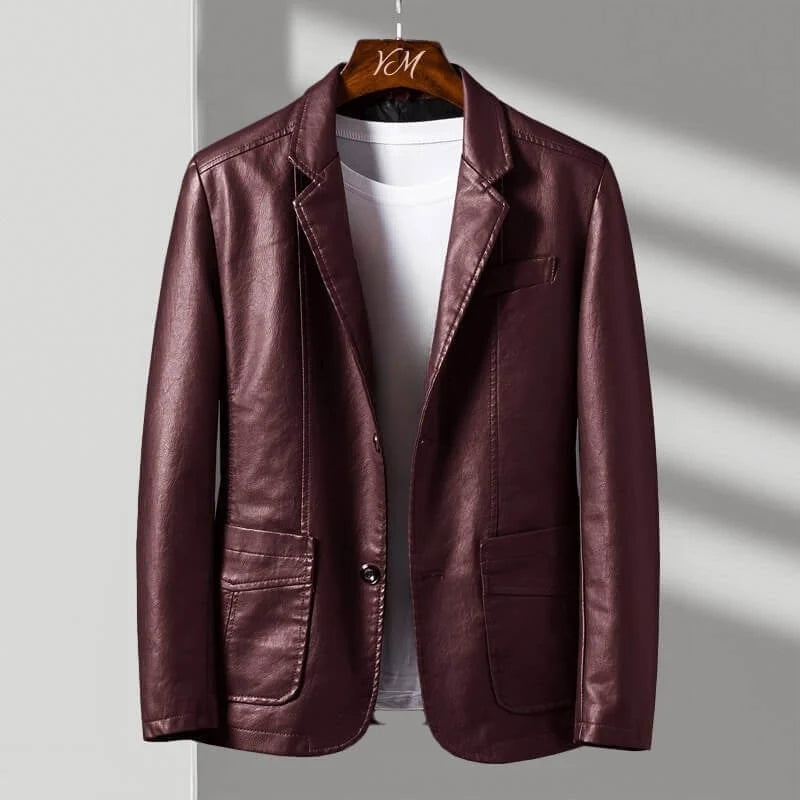 Brown leather jacket on a hanger against a neutral background