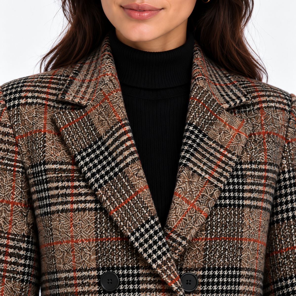 Close-up of women's brown plaid blazer with notched lapels and double-breasted buttons
