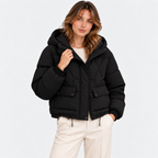 Women's black quilted puffer jacket with hood and front pockets