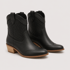 A pair of black leather western ankle boots with perforated side panels and a stacked wood-look heel, shown on a light gray background.