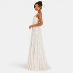 Woman wearing a white dress on a white background