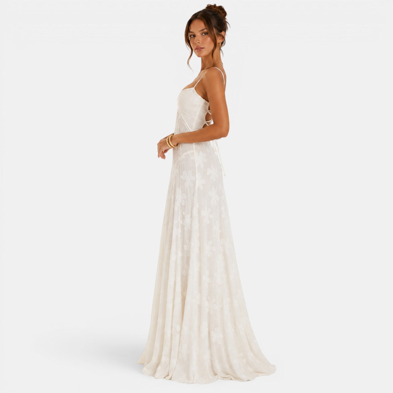 Woman wearing a white dress on a white background